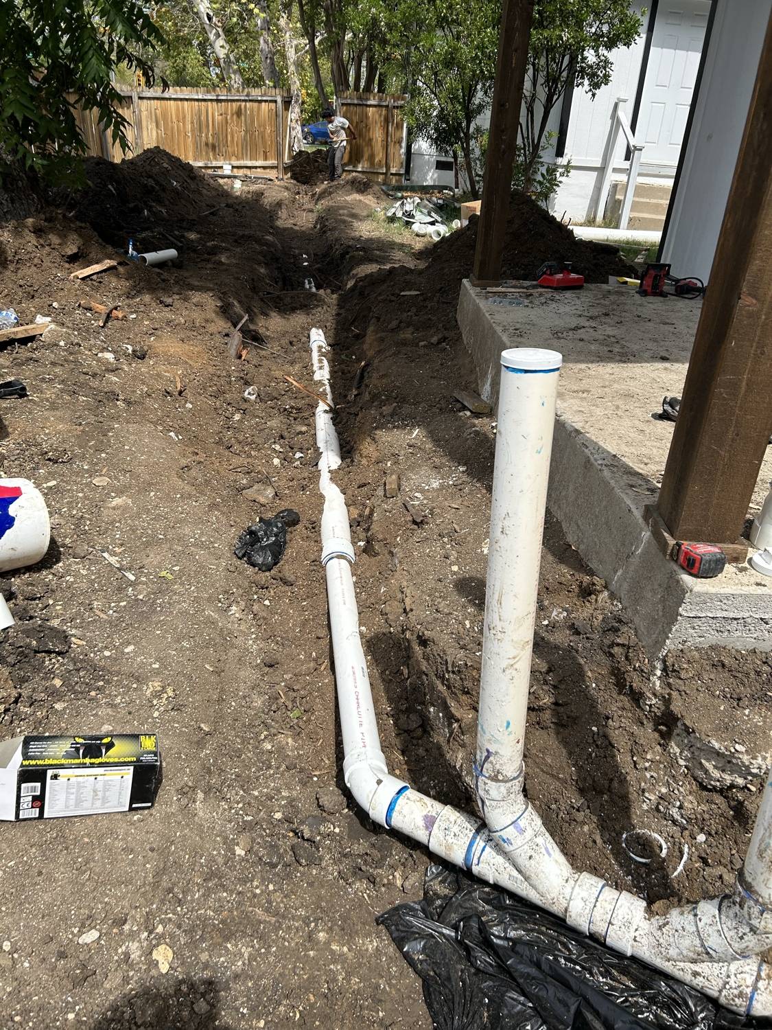 New PVC drain and sewer lines installed by Blue Diamond Plumbing during a drain repair
