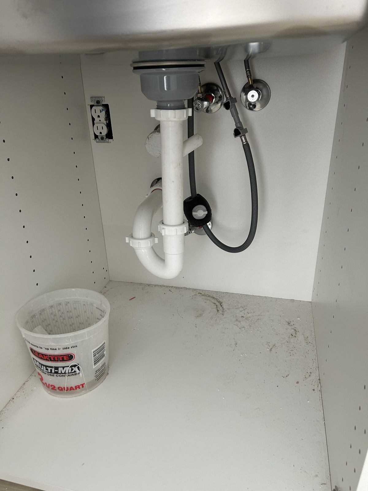 Under-sink P-trap and supply line repair completed by Blue Diamond Plumbing