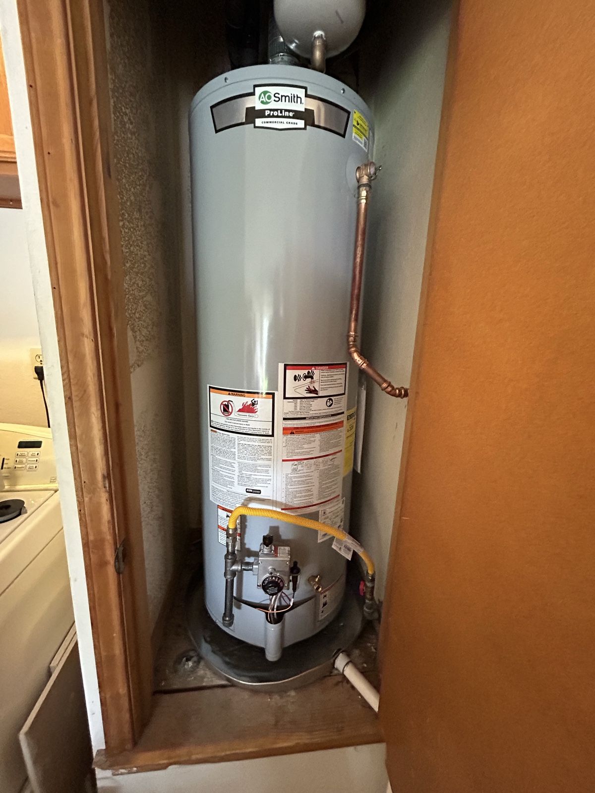 Repaired gas tank water heater serviced by Blue Diamond Plumbing in a Hutto home